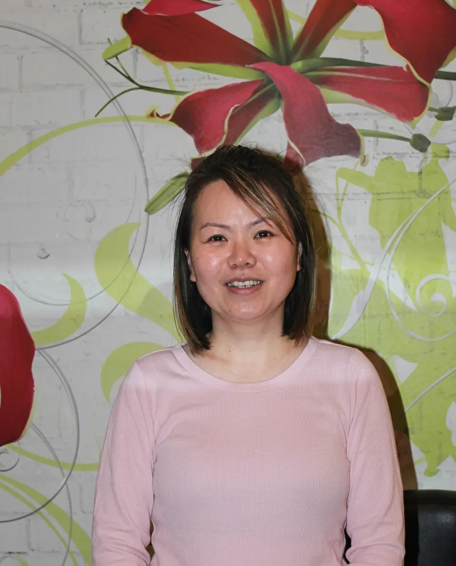 Portrait of Vicky, owner and stylist of Nu Look Salon